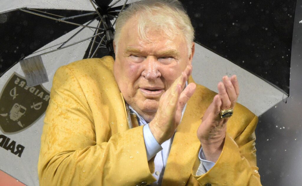 How old was John Madden when he quit coaching?