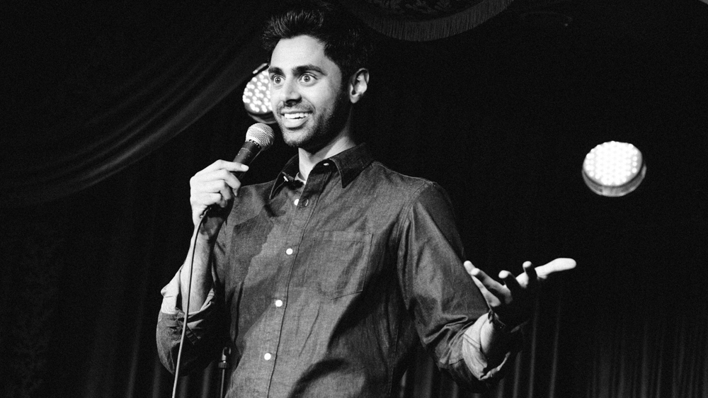 What is the theme of prom by Hasan Minhaj?