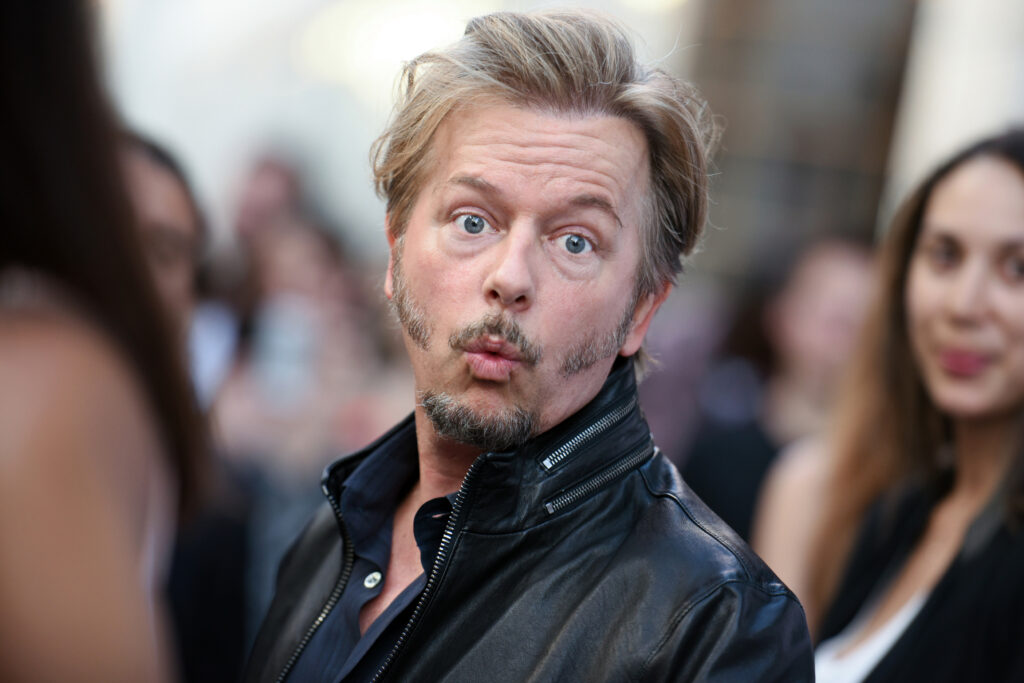 How is David Spade so rich?