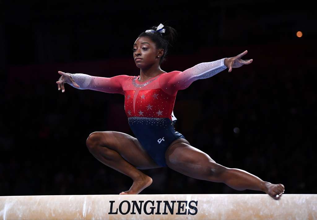 How did Simone Biles become a millionaire?