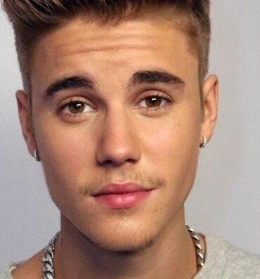 Who is the richest singer alive?