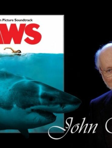 Who hired John Williams to score Jaws?