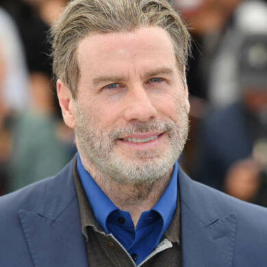 How rich is Travolta?