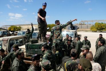 Who is the head of Libya?