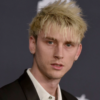 How much did Machine Gun Kelly pay for his name?