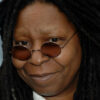 Why does Whoopi Goldberg have no eyebrows?