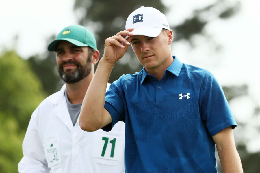 What does Jordan Spieth pay his caddy?