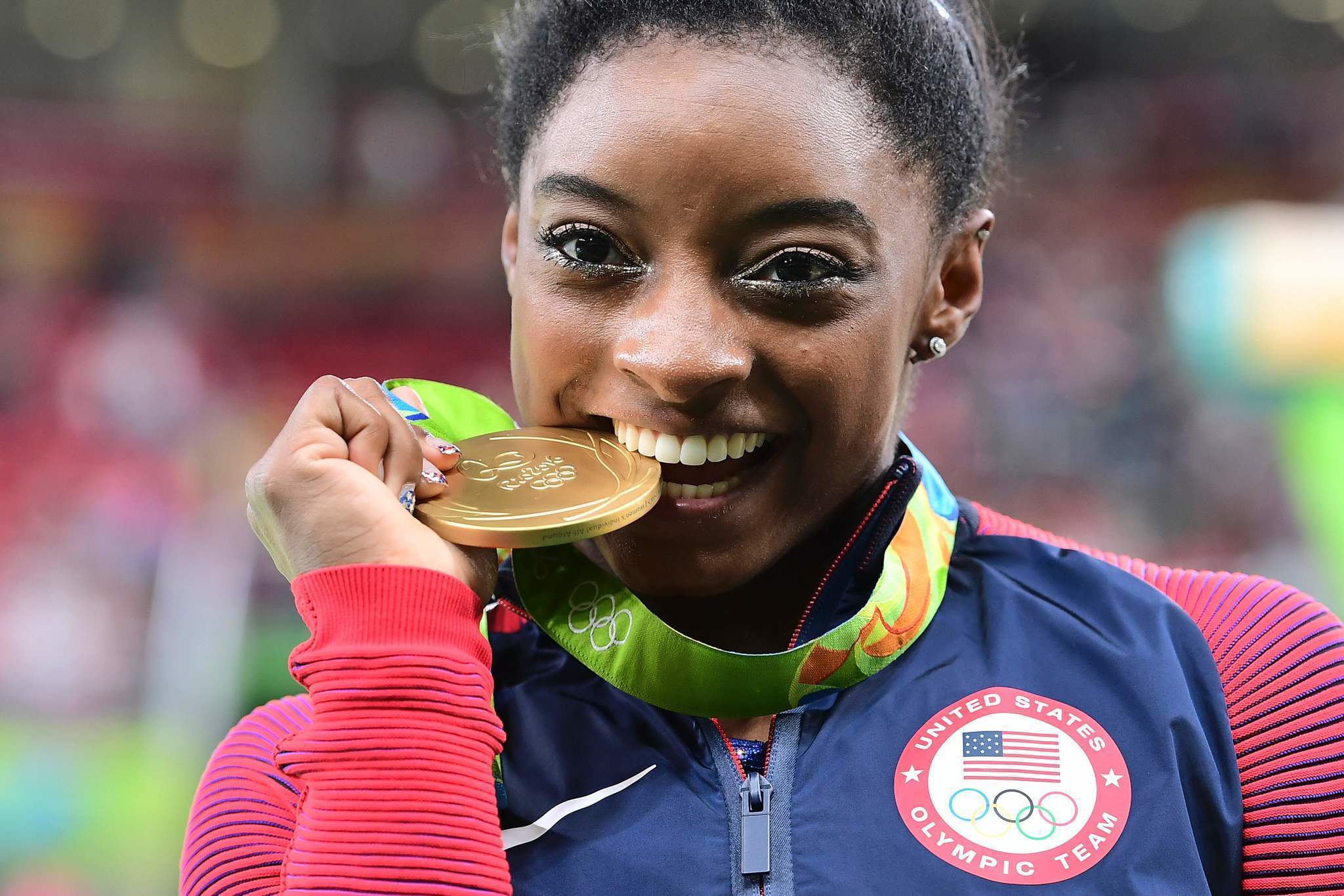 Who is the richest gold medalist?
