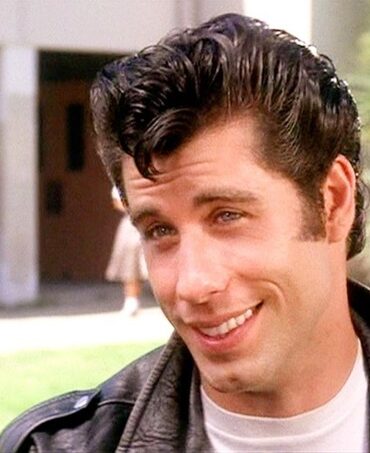 Did Travolta really sing in Grease?